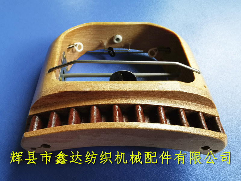 Hat-belt loom shuttle Picture of shuttle on arc loom